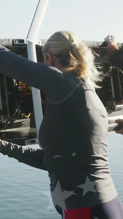 Vertical video: Woman lifting engine hatch and inspecting marine engine, Stock Footage 333542033