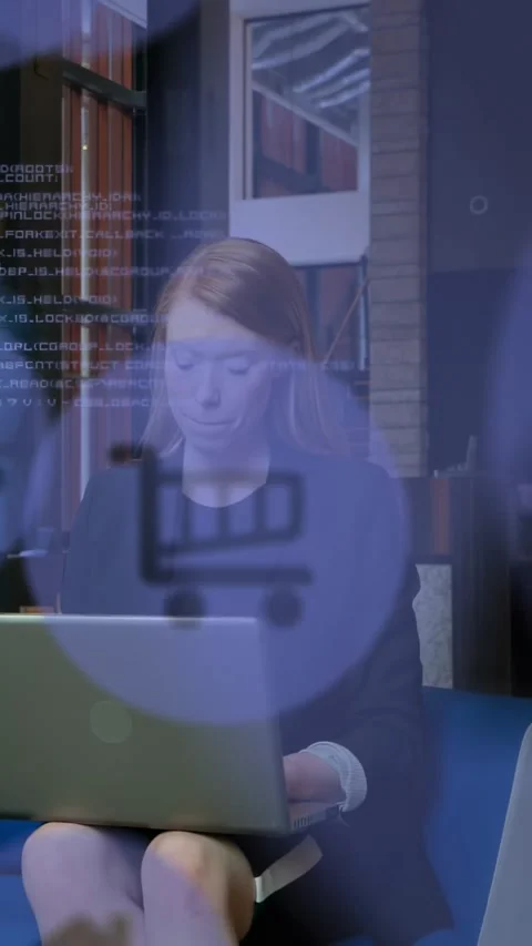 Vertical video: Woman looking down and typing on laptop, showing code and cart Stock Footage 332546691