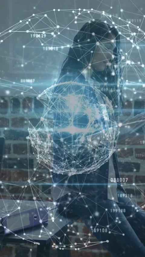 Vertical video: Woman looking down then rising, reviewing data, AR globe Stock Footage 333480286