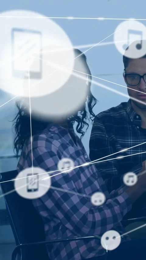 Vertical video: Woman pointing causing phone music icons linking over business Stock Footage 334382320