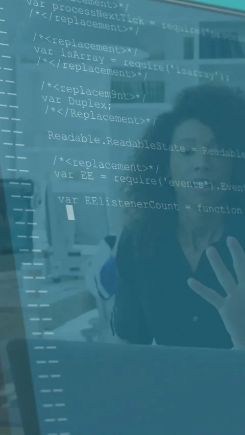 Vertical video: Woman presenting code in office, gesturing to laptop causing Stock Footage 331168908