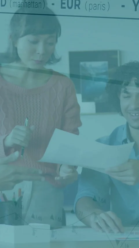 Vertical video: Woman presenting doc, man moving doc as finance graph appearing Stock Footage 332278311