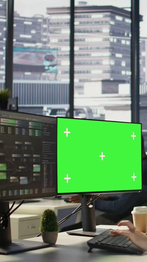 Vertical video Woman programming using chroma key computer Stock Footage 319482886