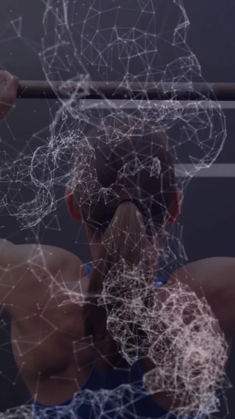 Vertical video: Woman pulling on pullup bar in gym causing animated mesh mapping Stock Footage 331030091