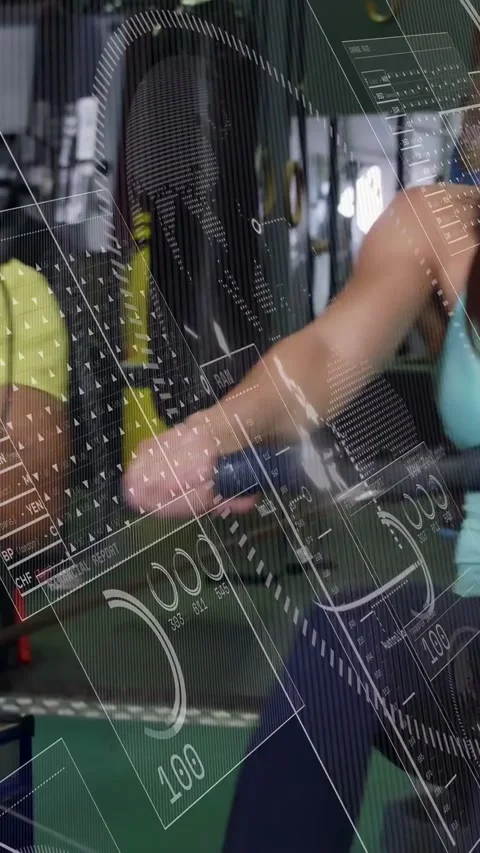 Vertical video: Woman pulling rowing handle and driving steady strokes, HUD Stock Footage 332806567