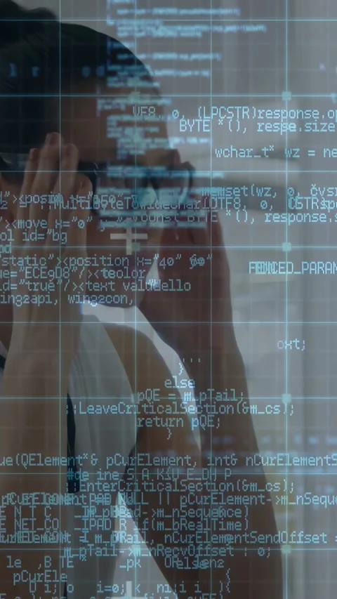 Vertical video: Woman reading tech code, rubbing head from bug, adjusting Stock Footage 333020937