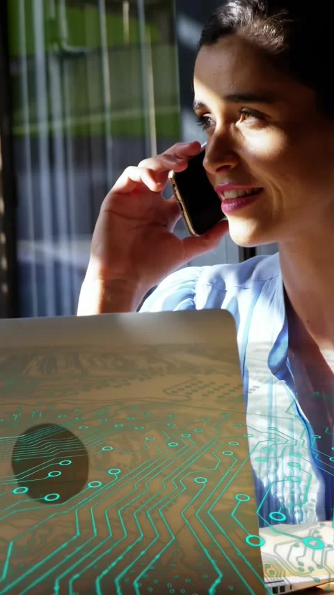 Vertical video: Woman taking call, listening speaking smiling with laptop teal Stock Footage 330359097