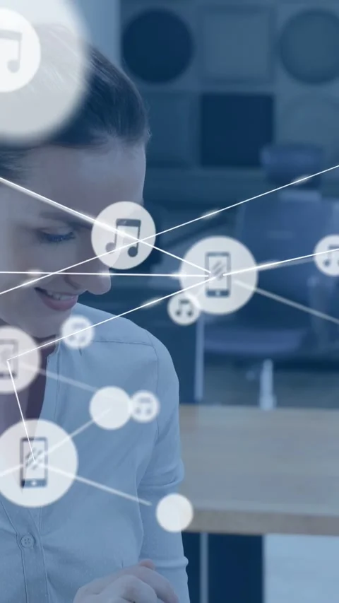 Vertical video: Woman tapping device causing tech phone icons moving across Stock Footage 333259899