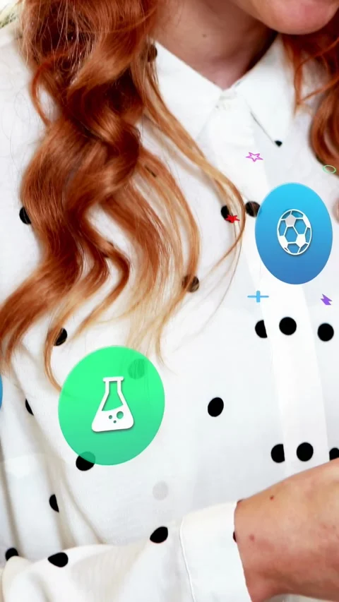 Vertical video: Woman tapping device in studio, generating education icons and Stock Footage 335802804