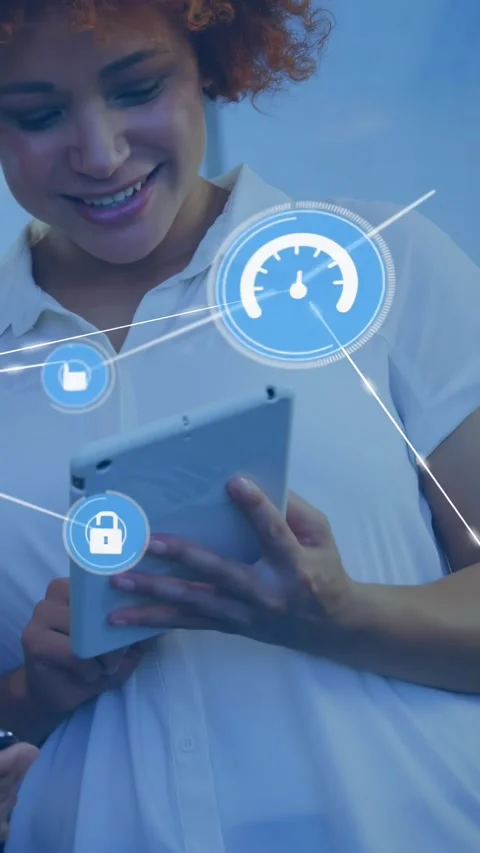 Vertical video: Woman tapping tablet, starting lock icons, gauges linking tech Stock Footage 331178035