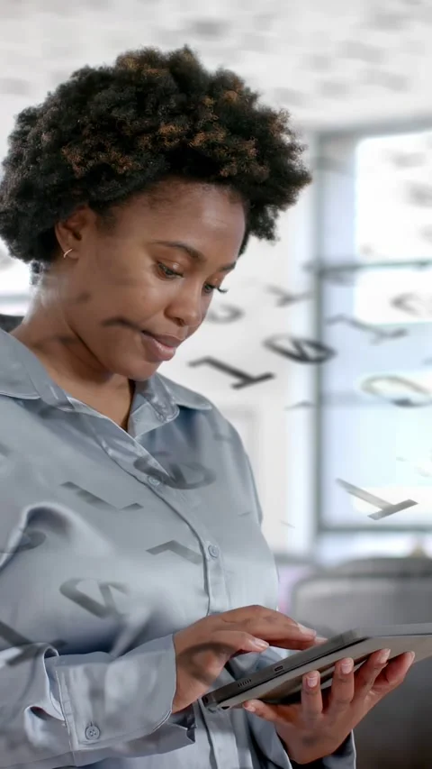 Vertical video: woman tapping tablet starting IT data with floating binary Stock Footage 333596088