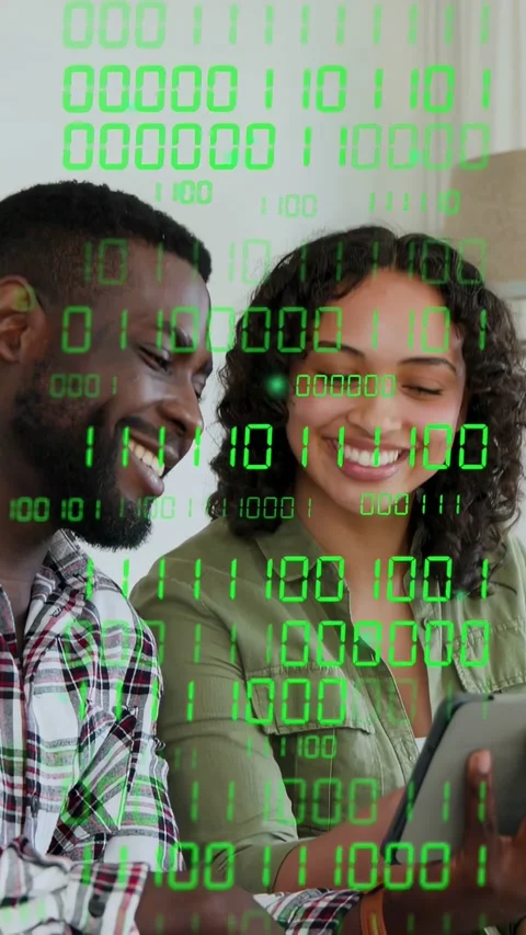 Vertical video: Woman tapping tablet man pointing both viewing tech content Stock Footage 334296431