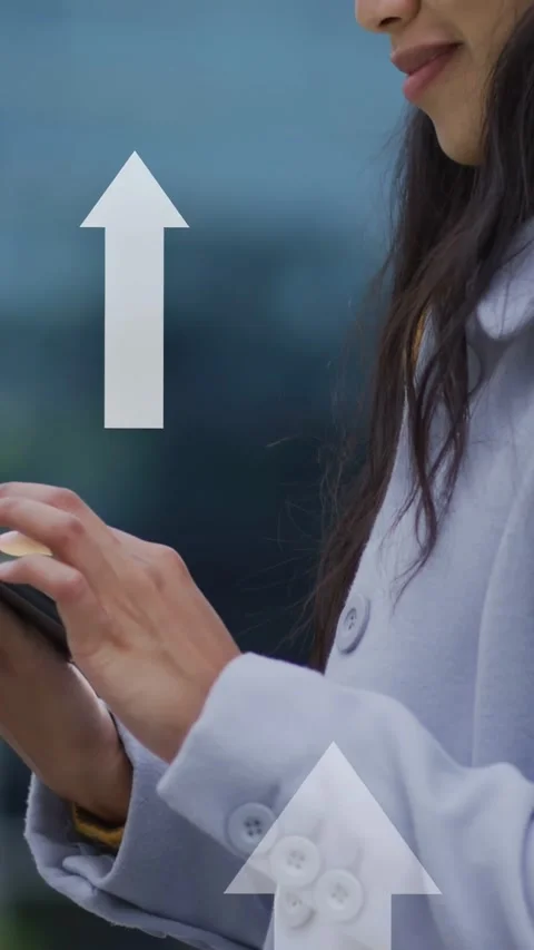 Vertical video: Woman tapping tablet causing overlay arrows, cam widening Stock Footage 335355759