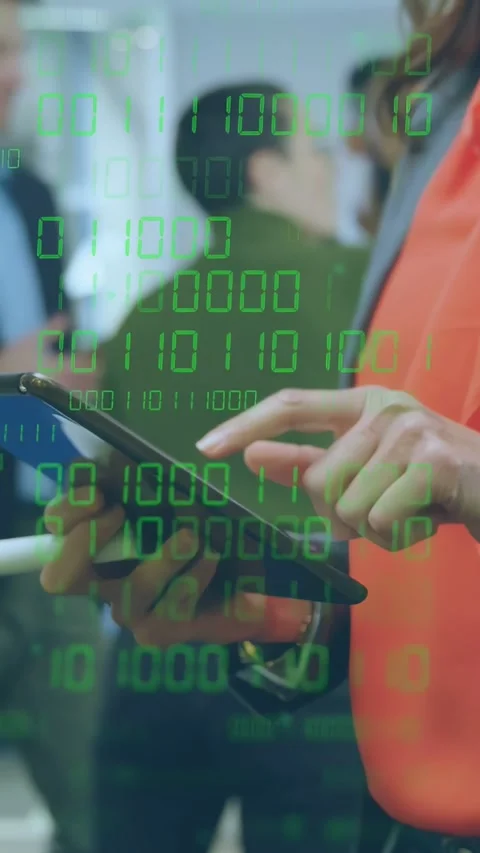 Vertical video: Woman tapping tablet at tech event viewing info as green binary Stock Footage 335802582