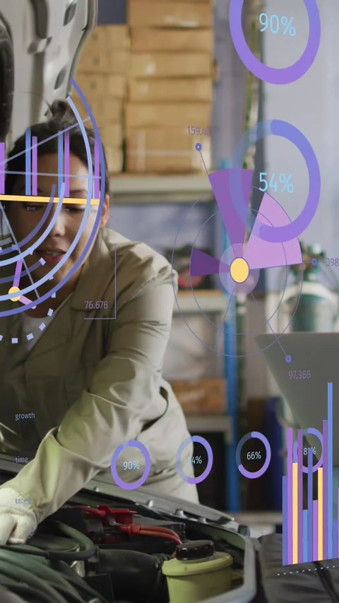 Vertical video: Woman tech checking engine in garage, reading laptop and using Stock Footage 335513588