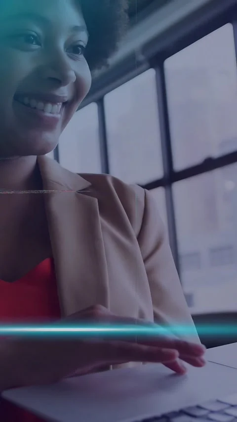 Vertical video: Woman tech dev typing on laptop near window, previewing live Stock Footage 334694934