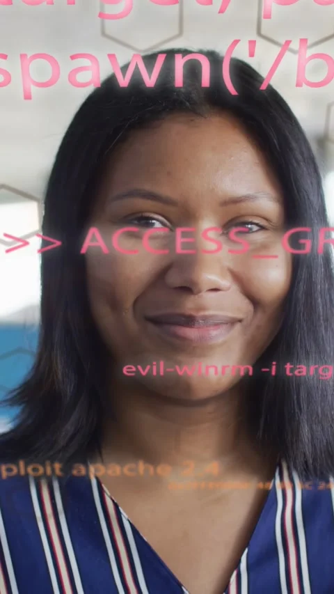 Vertical video: Woman in tech office reacting to ACCESS_GRANTED overlay moving Stock Footage 333603772