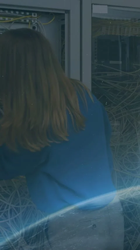 Vertical video: Woman tech reaching patch panel in rack sorting wires for IT Vídeos de archivo 332594913