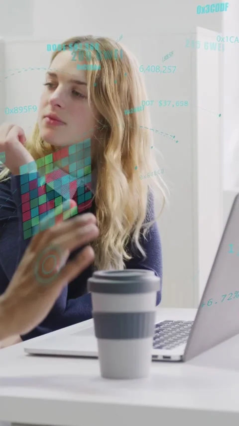 Vertical video: Woman using laptop while hand entering and pointing at tech data Stock Footage 333496674