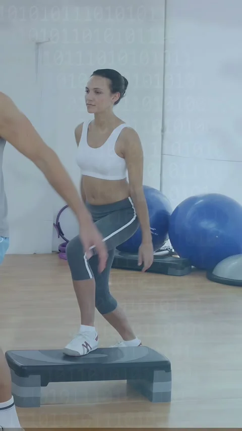 Vertical video: Woman using step after fitness cue, clapping, lifting knee, Stock Footage 333513352
