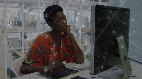 Vertical video: Woman using stylus on tablet, initiating design updates on Stock Footage 334182947