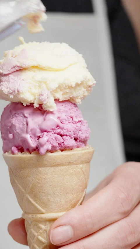 A scoop of pink ice cream in a specializ, Stock Video