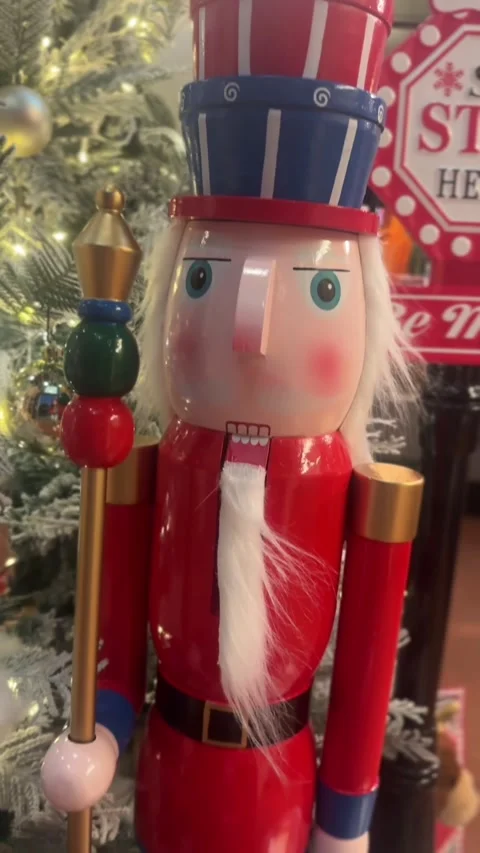 Vertical video of wooden nutcracker with stacked hat Stock Footage 324416652