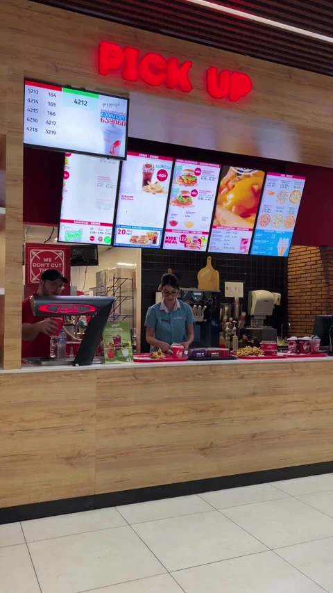 Vertical video. Work in progress at Wendy's fast food restaurant Stock Footage 312628971