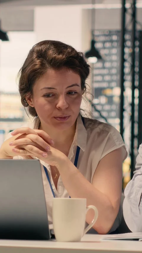 Vertical Video Work team, business intelligence, forecasting reports Stock Footage 329320995
