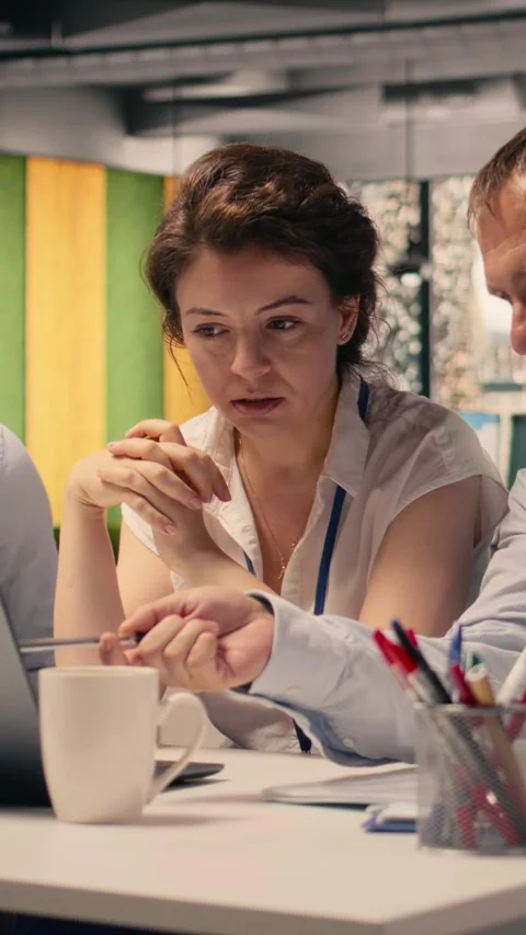 Vertical Video Work team, business intelligence, forecasting reports Stock Footage 329321648