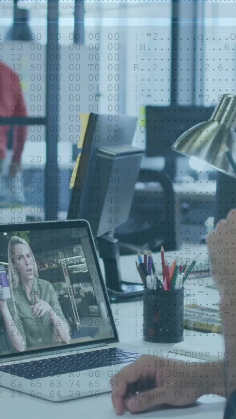 Vertical video: Worker joining tech call, lifting pen, reviewing data while code Stock Footage 329961747