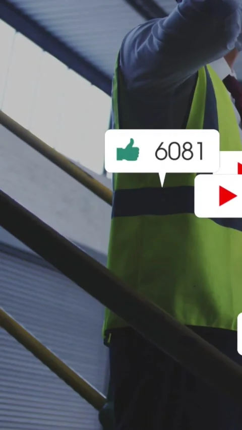 Vertical video: Worker lifting hand to ear in warehouse, taking call as icons Stock Footage 331790680