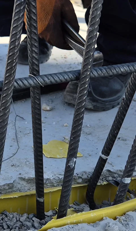 Vertical Video Worker Tying Steel Rebars Close Up Stock Footage 338226951