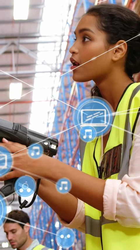 Vertical video: Worker using scanner in warehouse activating blue icons around Stock Footage 331199301