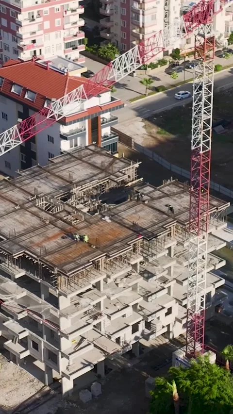 Vertical Video: Workers and engineers collaborate actively to prepare metal Stock-Footage 297640481