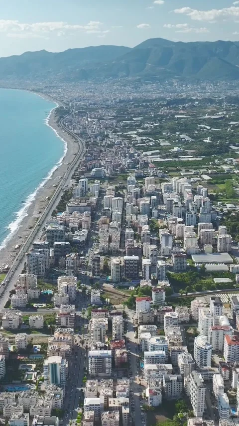Vertical Video: Workers and Heavy Machines Shape the Structure on a Busy Stock Footage 344278179