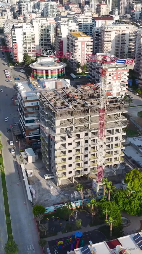 Vertical Video Workers Handling Materials on Elevated Construction Platform Stock Footage 342115046