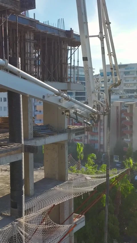 Vertical Video: Workers Installing Framework for Concrete Pouring at a Video stock 342567756