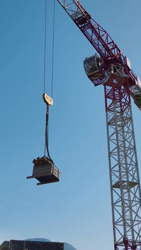 Vertical Video Workers Installing Materials on High Rise Construction Floor Stock Footage 342129295