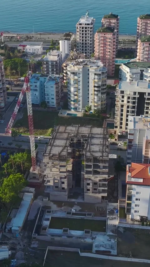 Vertical Video: Workers Installing Scaffolding and Preparing Framework for Stock Footage 342568480