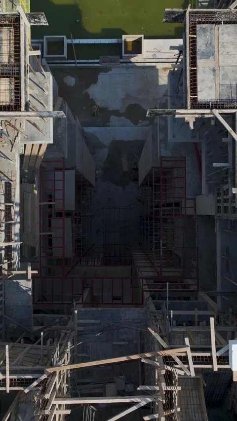 Vertical Video Workers Standing on Edge of Building Structure Stock Footage 341834252