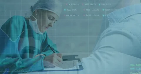 Vertical video: Writing RN in scrubs cap mask visit noting clipboard sliding as Stock Footage 331270065