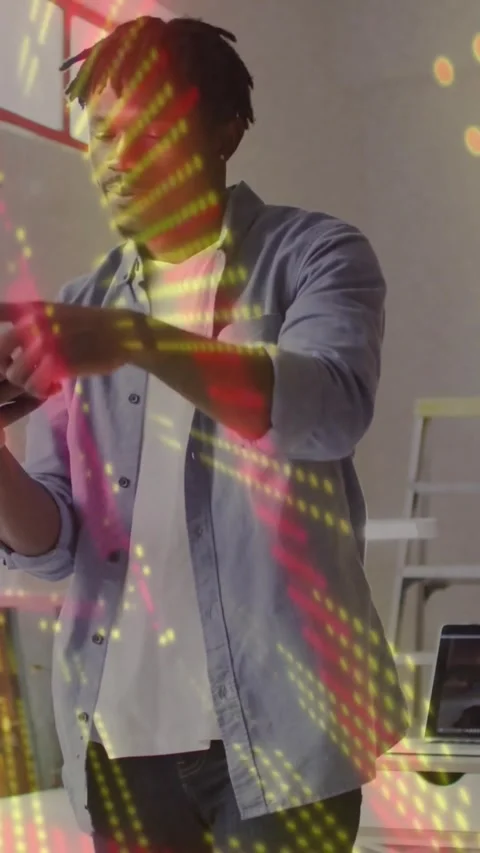 Vertical video: Yellow-red lights starting man reaching tapping phone checking Stock Footage 331790325