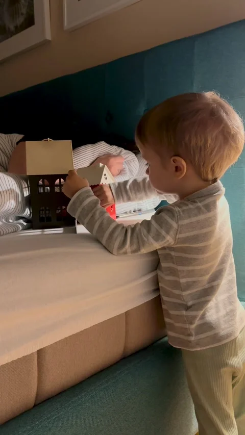 Vertical Video of Young Child Playing at Home Video stock 345165032