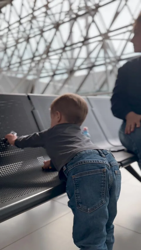 Vertical Video of Young Child Waiting at Modern Airport 库存影片 345163285
