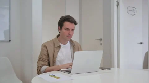 Vertical Video, Young Creative Man Typing on Laptop Video stock 312913958