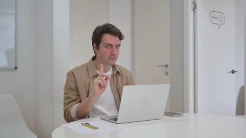 Vertical Video, Young Creative Man in Denial Looking at Camera While Working on Stock Footage 312913990