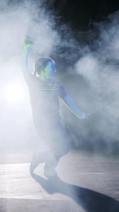 Vertical Video of young female dancer performing hip hop dance with strobe light Stock Footage 251556439