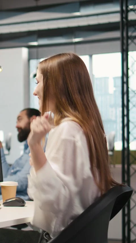 Vertical video Young female programmer uses computer to write code, developing Stock Footage 312708262