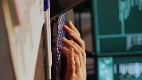 Vertical video: Young hacker breaking into database server on computer Stock Footage 221656281